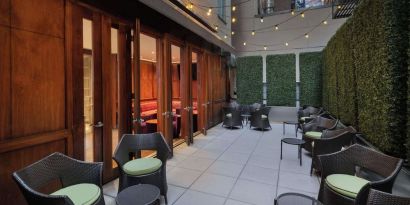 Veranda with ample seats perfect for coworking at Best Western Premier Herald Square.