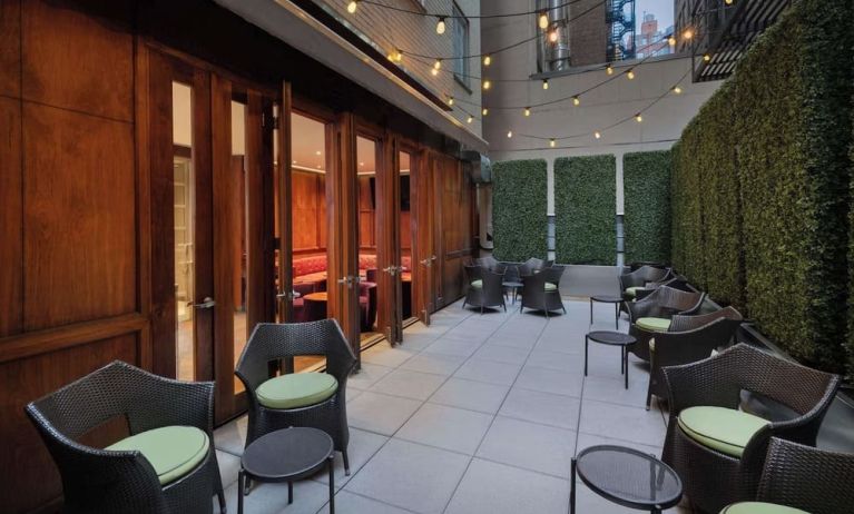 Veranda with ample seats perfect for coworking at Best Western Premier Herald Square.