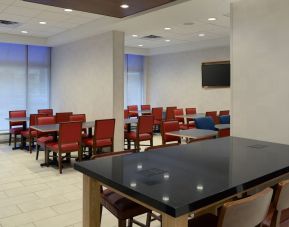 Restaurant area with comfortable sitting perfect for co-working at Holiday Inn Express Toronto Downtown.