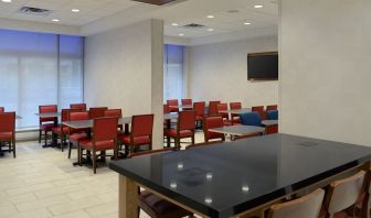 Restaurant area with comfortable sitting perfect for co-working at Holiday Inn Express Toronto Downtown.