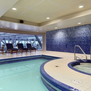 Relaxing indoor pool at Fairmont Vancouver Airport - YVR Terminal Hotel.