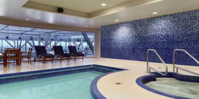 Relaxing indoor pool at Fairmont Vancouver Airport - YVR Terminal Hotel.