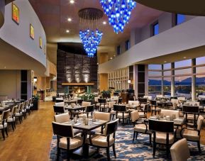 Hotel restaurant with comfortable sitting at Fairmont Vancouver Airport - YVR Terminal Hotel.