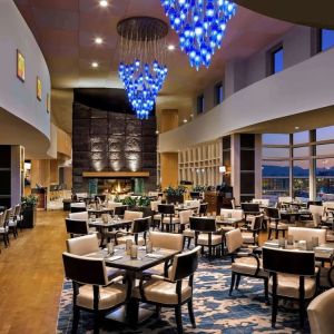 Hotel restaurant with comfortable sitting at Fairmont Vancouver Airport - YVR Terminal Hotel.