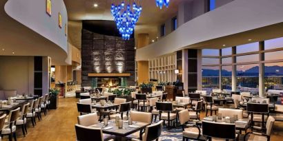 Hotel restaurant with comfortable sitting at Fairmont Vancouver Airport - YVR Terminal Hotel.