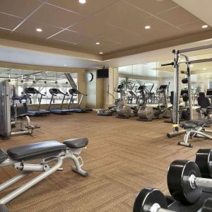 Fully equipped fitness center at Fairmont Vancouver Airport - YVR Terminal Hotel.