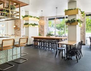 Dining area perfect for coworking at YVE Hotel Miami.