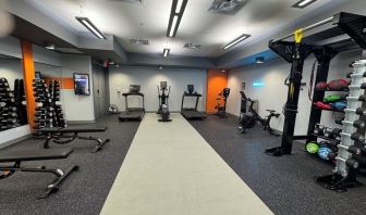 Fully equipped fitness center at Acclaim Hotel Calgary Airport.