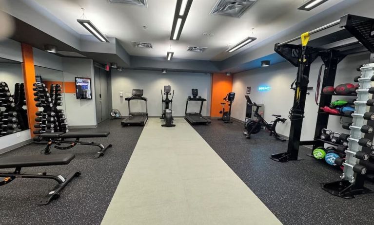 Fully equipped fitness center at Acclaim Hotel Calgary Airport.