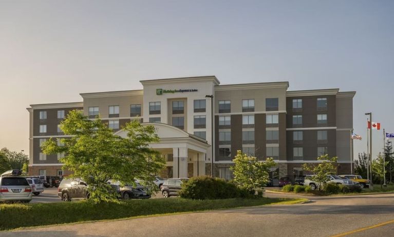 Hotel exterior with parking area at Holiday Inn Express & Suites North Bay.