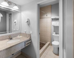 Guest bathroom with shower at The Live Hotel.