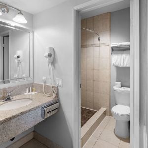 Guest bathroom with shower at The Live Hotel.