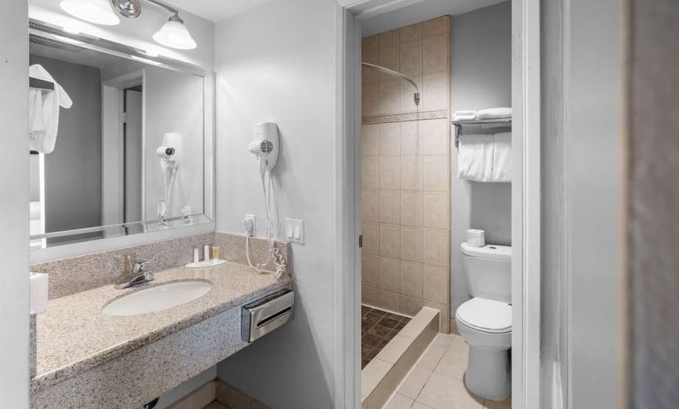 Guest bathroom with shower at The Live Hotel.