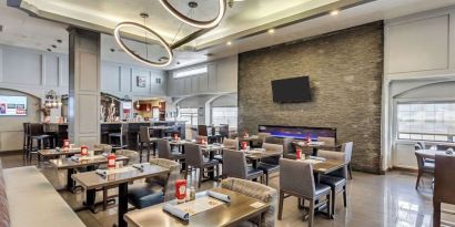 Dining area perfect for coworking at Radisson Hotel Salt Lake City Airport.