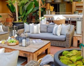 Outdoor seats in veranda at Hollywood Hotel.