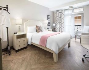 Queen bedroom with work desk at Hollywood Hotel.