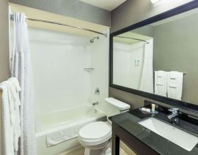 Private guest bathroom with tub at Comfort Inn Corner Brook.