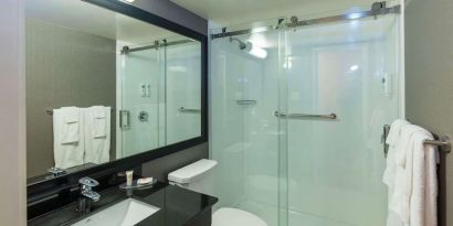 Guest bathroom with shower at Comfort Inn Corner Brook.