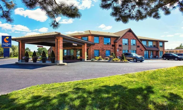 Hotel exterior and parking area at Comfort Inn Yarmouth.