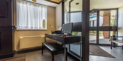 Lobby workspace with computer and printer at Comfort Inn Yarmouth.