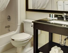 Guest bathroom with tub at Comfort Inn Yarmouth.