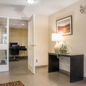 Business center with computer, printer and ergonomic chair at Comfort Inn Winnipeg II South.