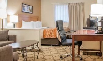 Day use suite with work desk and living area at Comfort Inn Winnipeg II South.