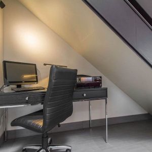 Business center with computer, printer and ergonomic chair at Comfort Inn Val D'or. 