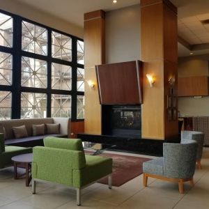 Lobby and coworking lounge at Holiday Inn Express Rolling Meadows-Schaumburg.