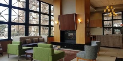 Lobby and coworking lounge at Holiday Inn Express Rolling Meadows-Schaumburg.