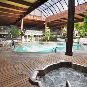 Indoor pool and spa tub at Sturbridge Host Hotel.