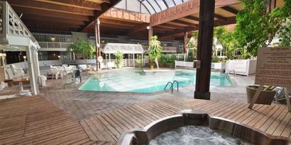 Indoor pool and spa tub at Sturbridge Host Hotel.