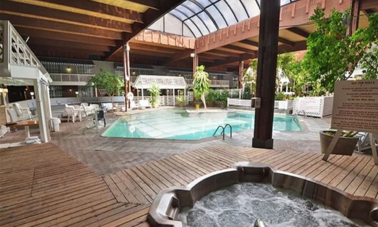 Indoor pool and spa tub at Sturbridge Host Hotel.