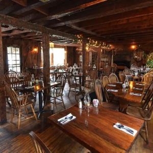 Dining area perfect for coworking at Sturbridge Host Hotel.