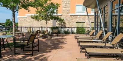 Outdoor furniture available at Cambria Suites Denver Airport.