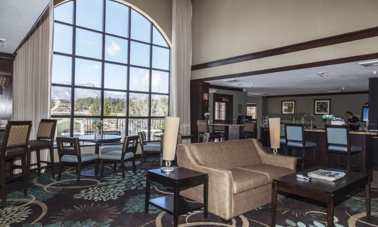 Lobby and coworking lounge at Staybridge Suites.