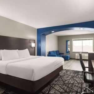 Day use room with living area and work desk at La Quinta Inn & Suites - North Stone Oak.