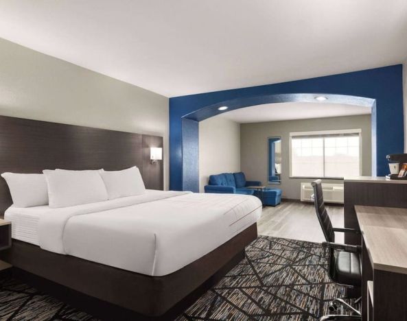 Day use room with living area and work desk at La Quinta Inn & Suites - North Stone Oak.