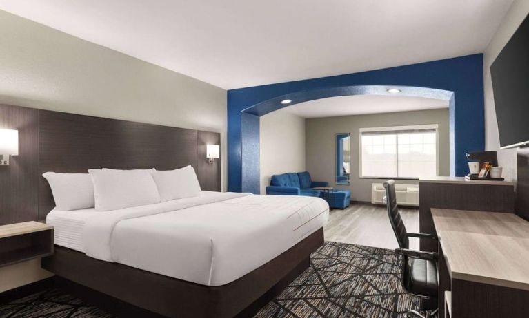 Day use room with living area and work desk at La Quinta Inn & Suites - North Stone Oak.