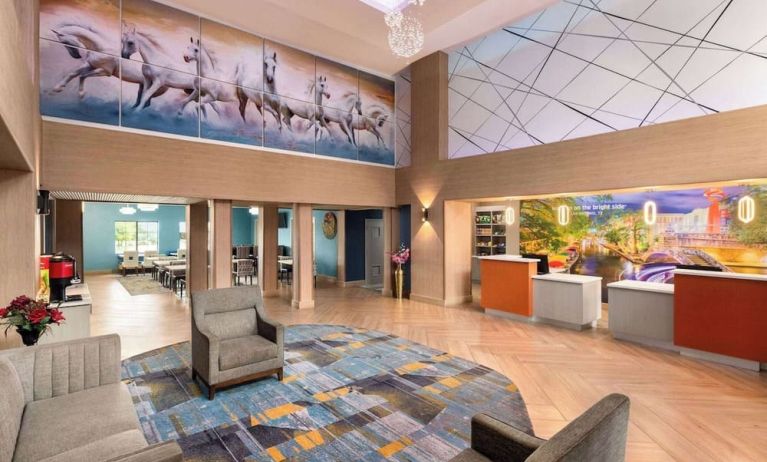 Lobby and coworking lounge at La Quinta Inn & Suites - North Stone Oak.