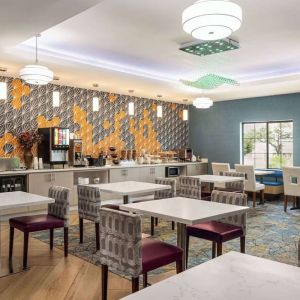 Dining area perfect for coworking at La Quinta Inn & Suites - North Stone Oak.