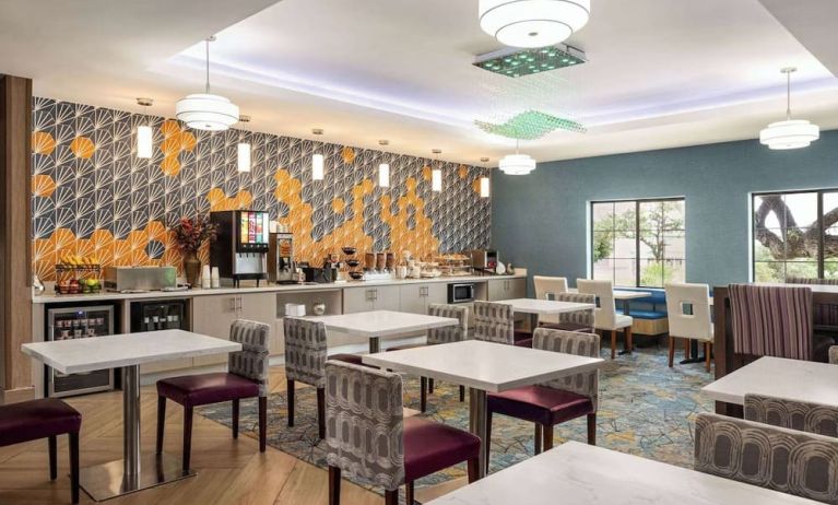 Dining area perfect for coworking at La Quinta Inn & Suites - North Stone Oak.