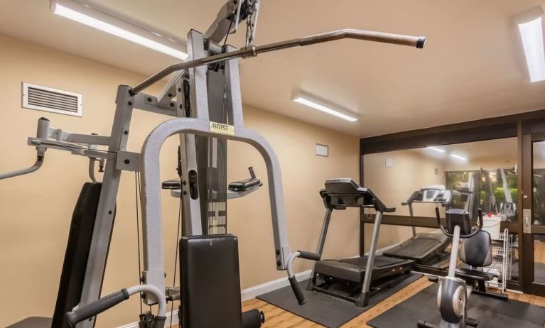 Fitness center at Coratel Plus Suites Wichita West Airport.