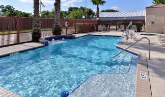 Refreshing outdoor pool at Hampton Inn Deer Park.