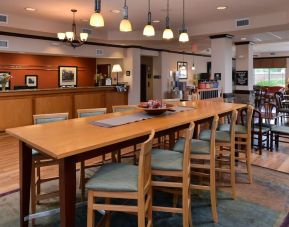 Dining area perfect for coworking at Hampton Inn Deer Park.