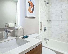 Guest bathroom with shower and tub at DoubleTree By Hilton Westborough.