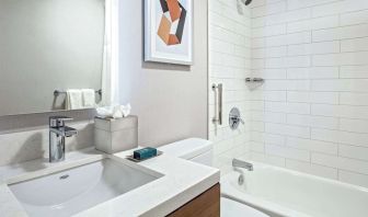 Guest bathroom with shower and tub at DoubleTree By Hilton Westborough.