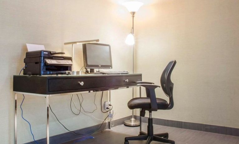 Business center with computer, printer and ergonomic chair at Comfort Inn Parry Sound.