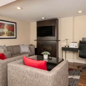 Lobby lounge Lobby lounge with workspace, TV screen and fireplace at Comfort Inn Ottawa East.