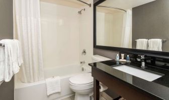 Private guest bathroom with tub and free toiletries at Comfort Inn Ottawa East.